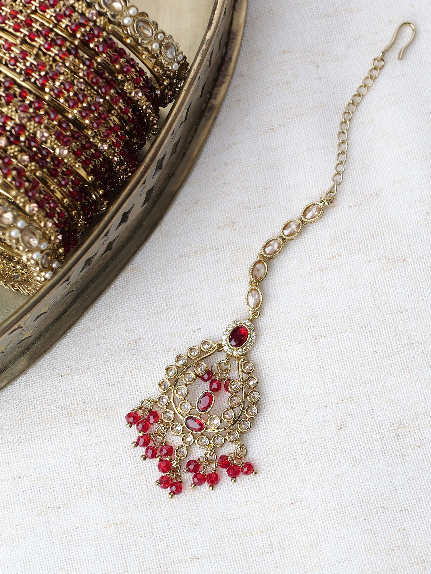 Adira Maang Tikka in Maroon