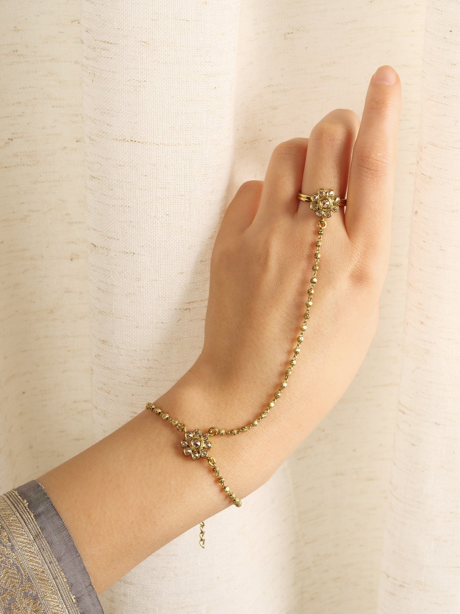 Forever Floral Hand Chain in Champagne and Antique Gold