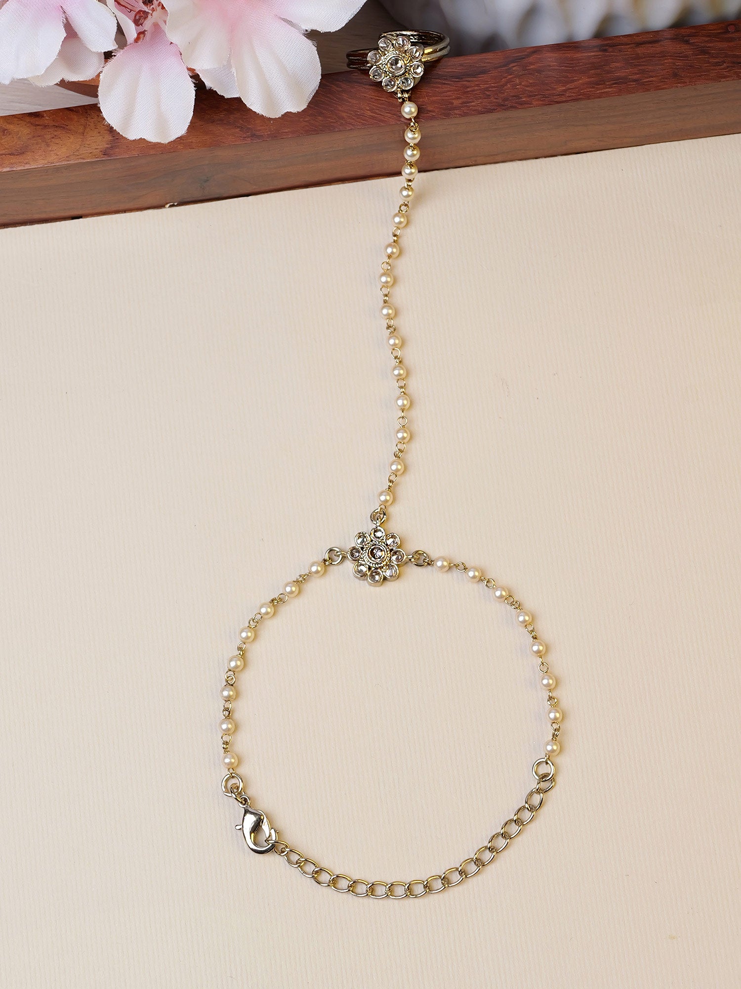 Forever Floral Hand Chain in Pearl in Champagne