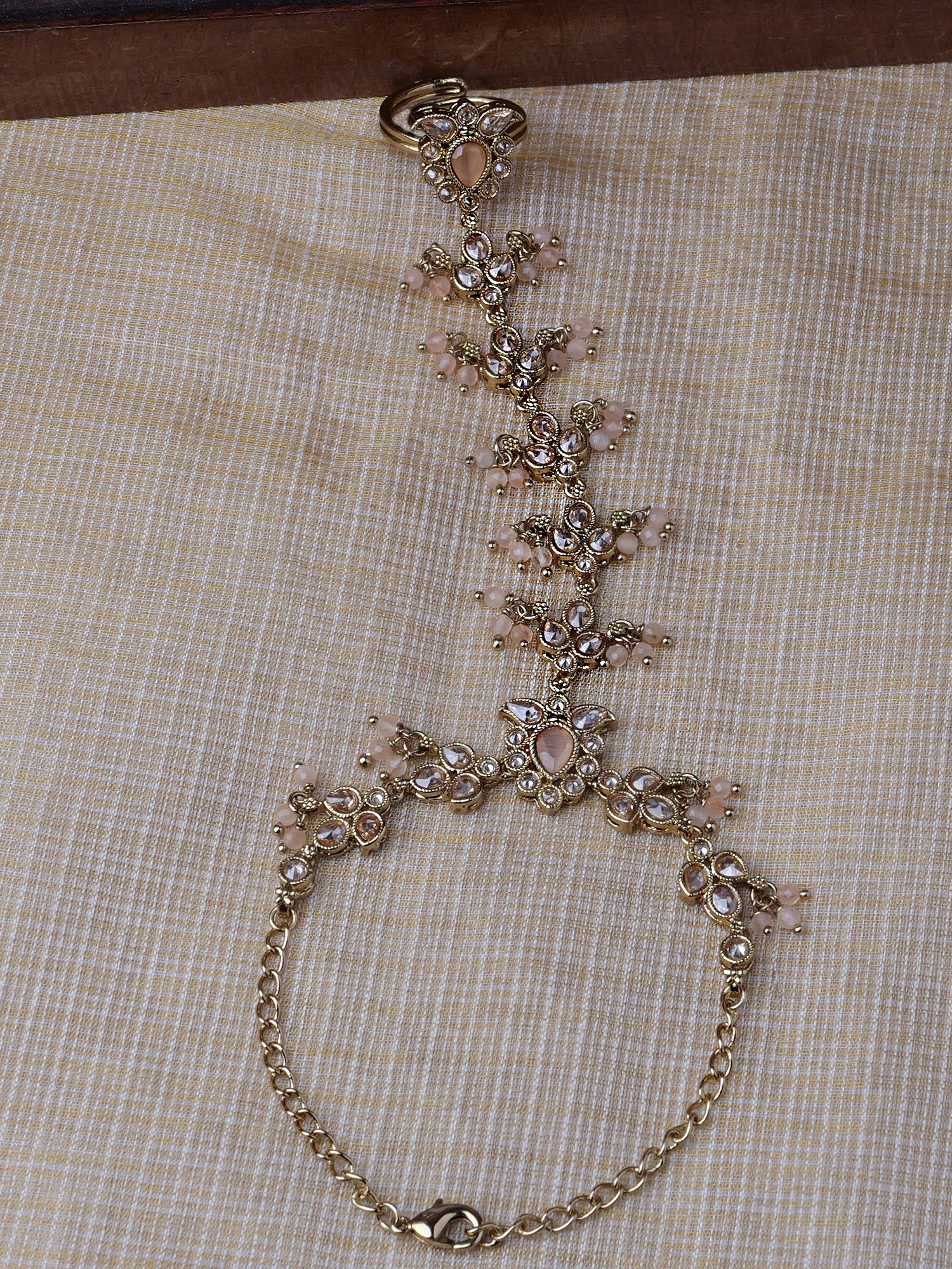 Ishita Hand Chain in Peach