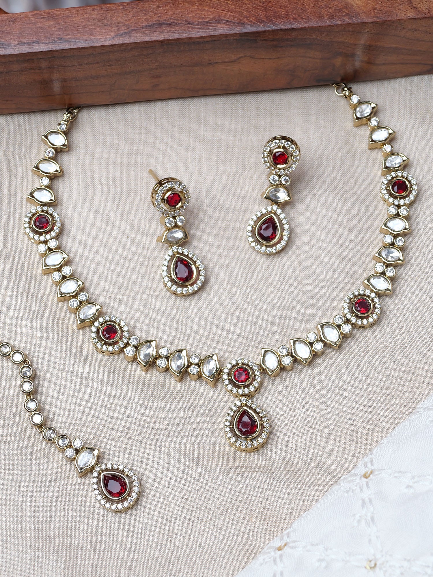 Neera Kundan Necklace Set in Maroon