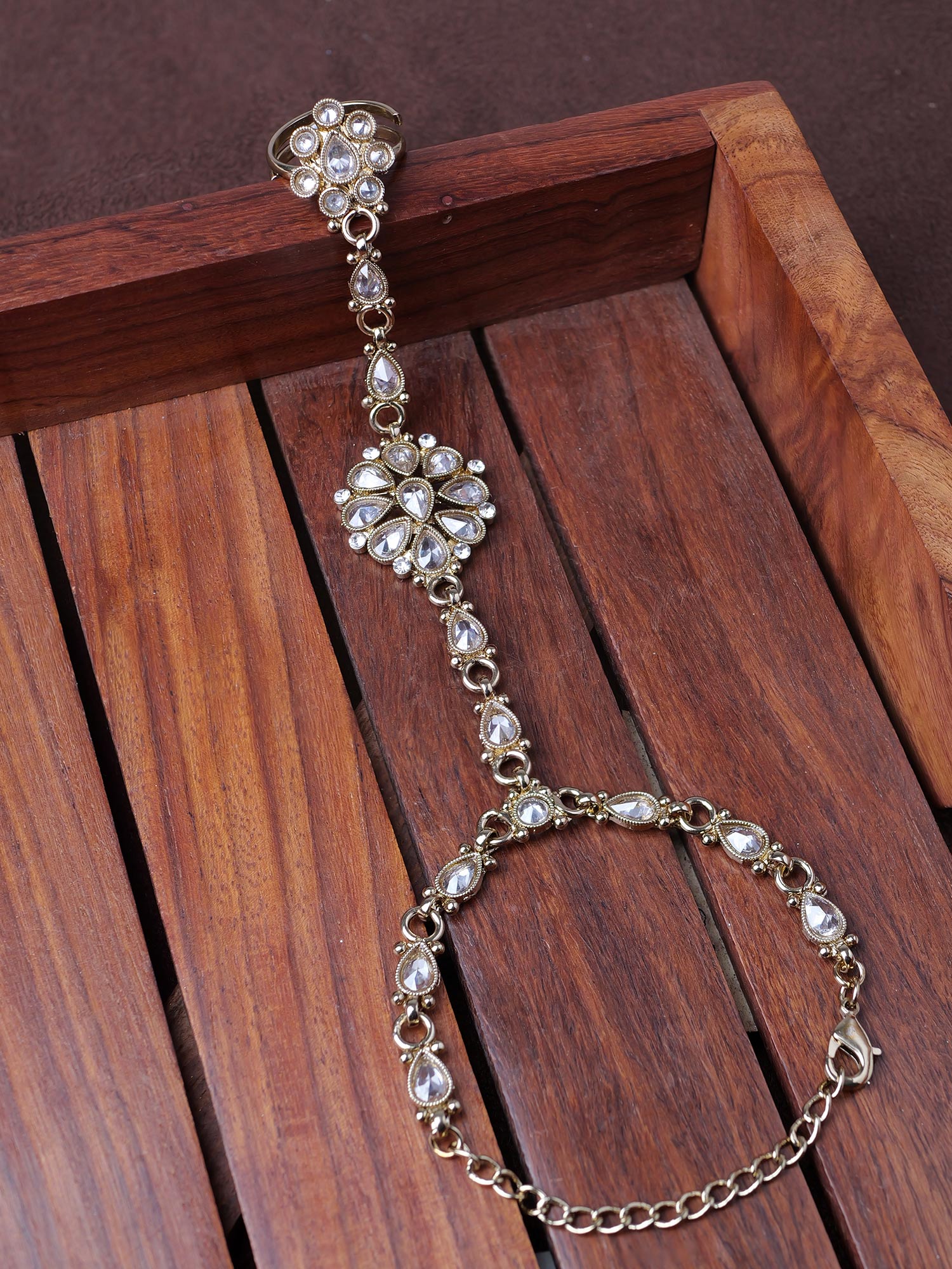 Saira Hand Chain in White and Antique Gold