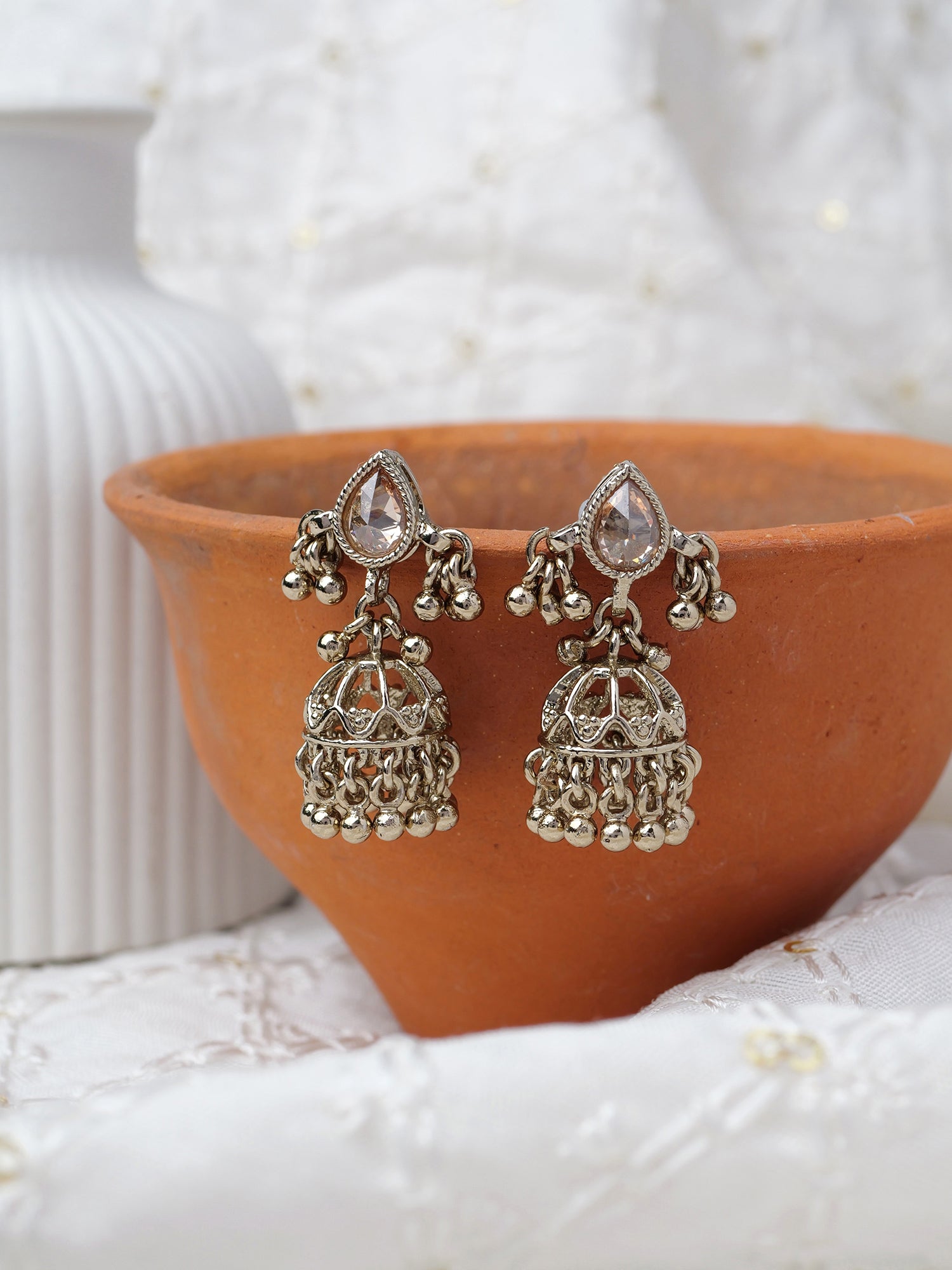 Shaila Jhumka Earrings in Antique Gold