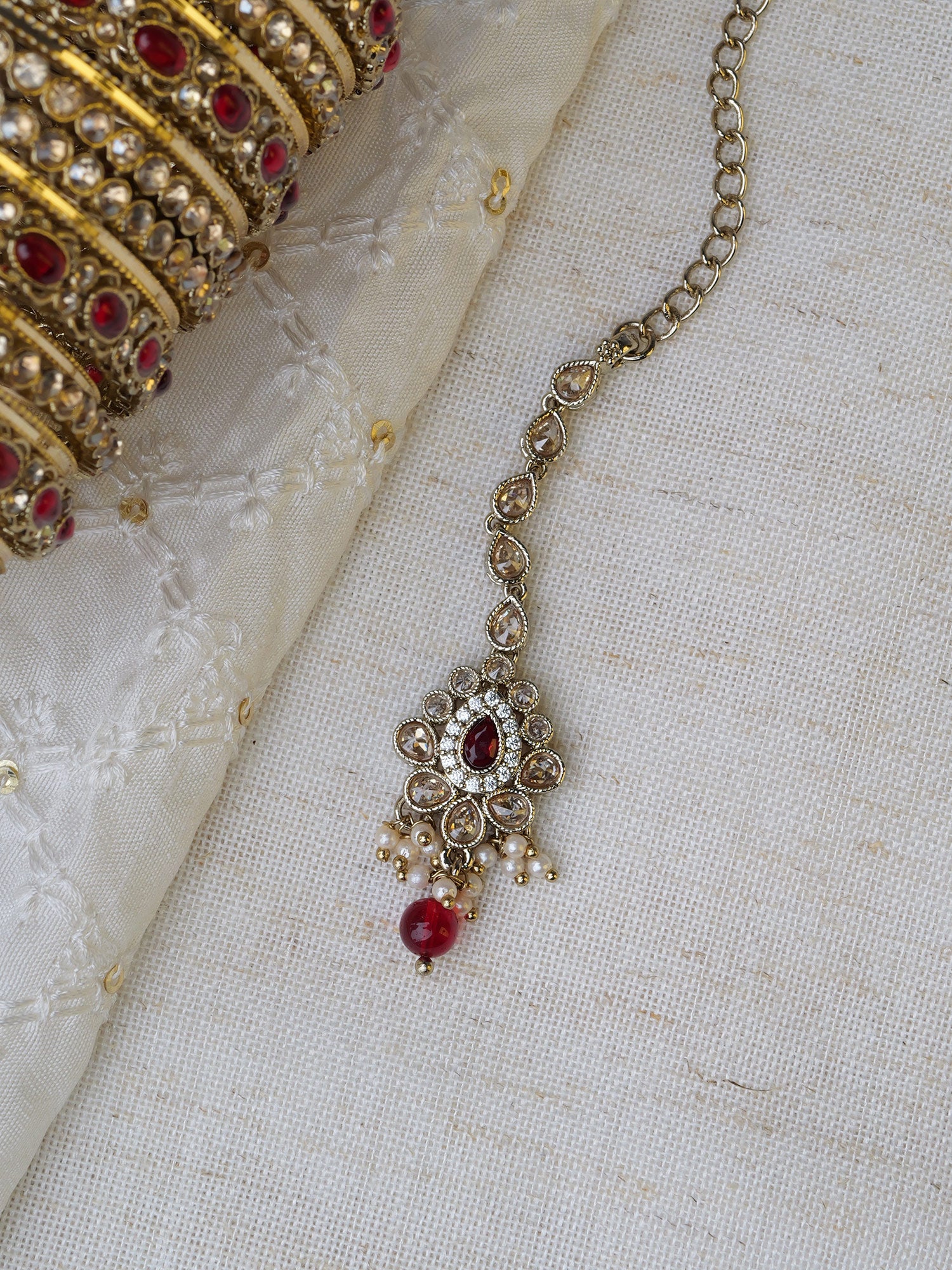 Sonal Pearl Maang Tikka in Maroon