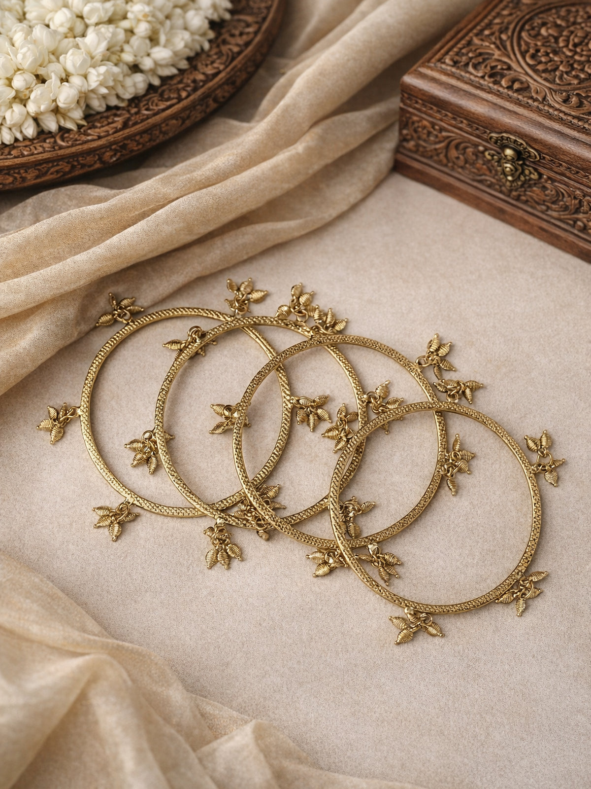 Tulsi Leaf Drop Bangles in Antique Gold