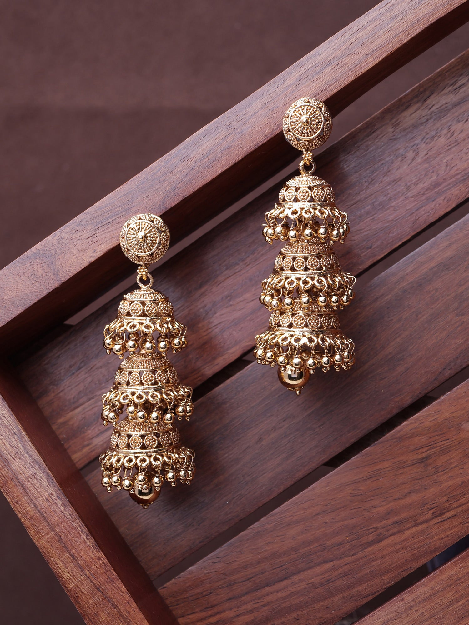 Usha Classic Triple Jhumka Earrings in Gold