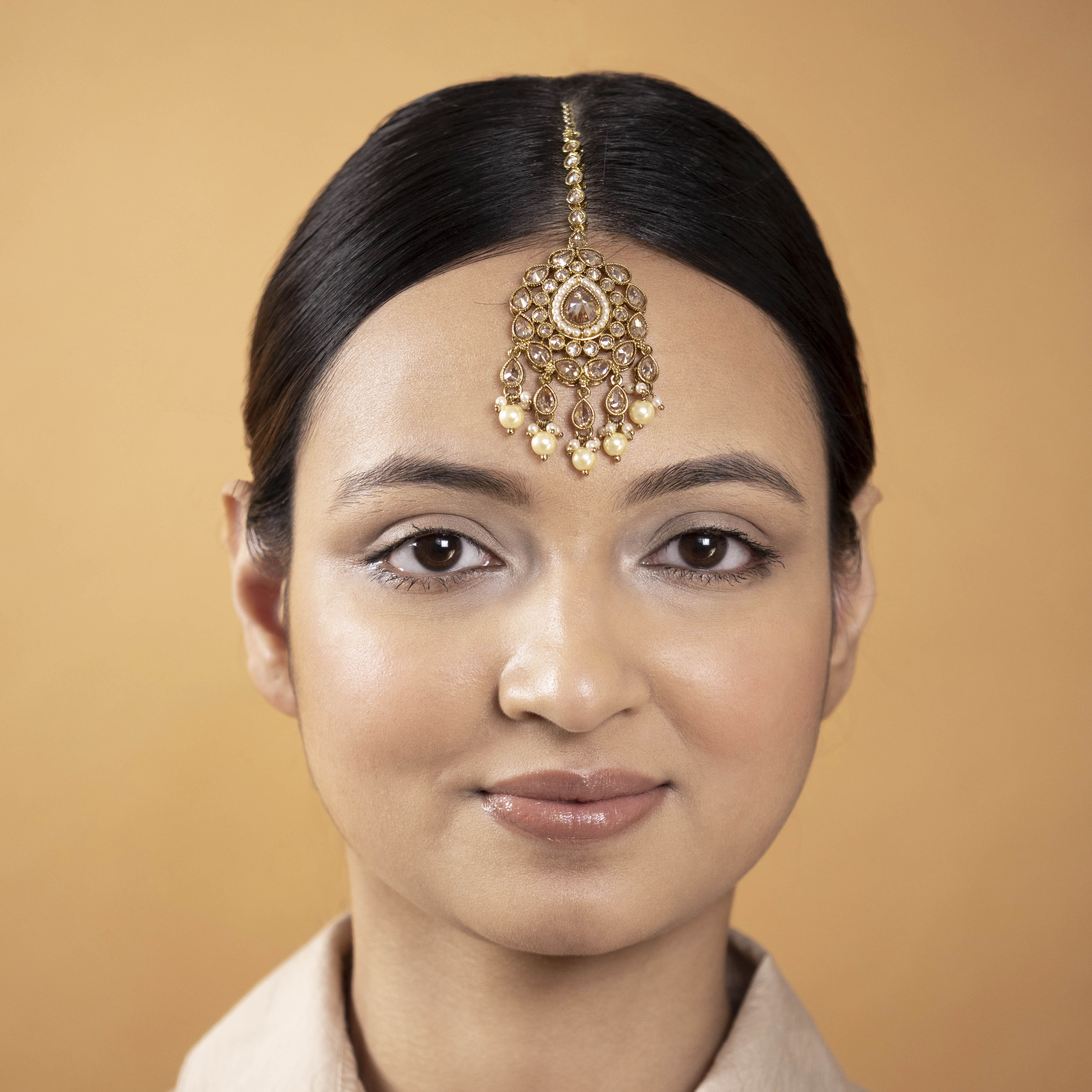 Tanushree Tikka in Pearl and Antique Gold