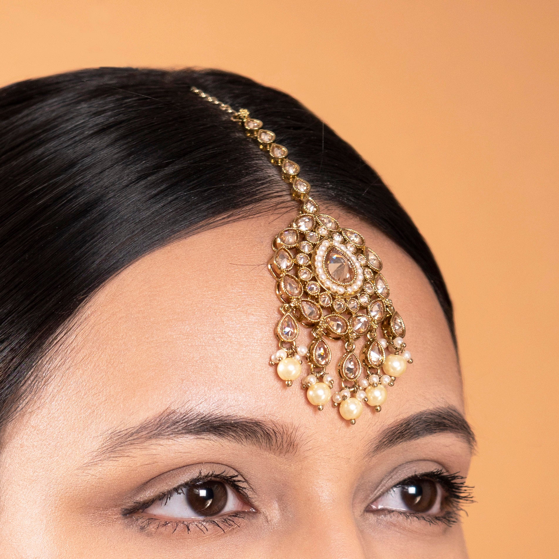Tanushree Tikka in Pearl and Antique Gold