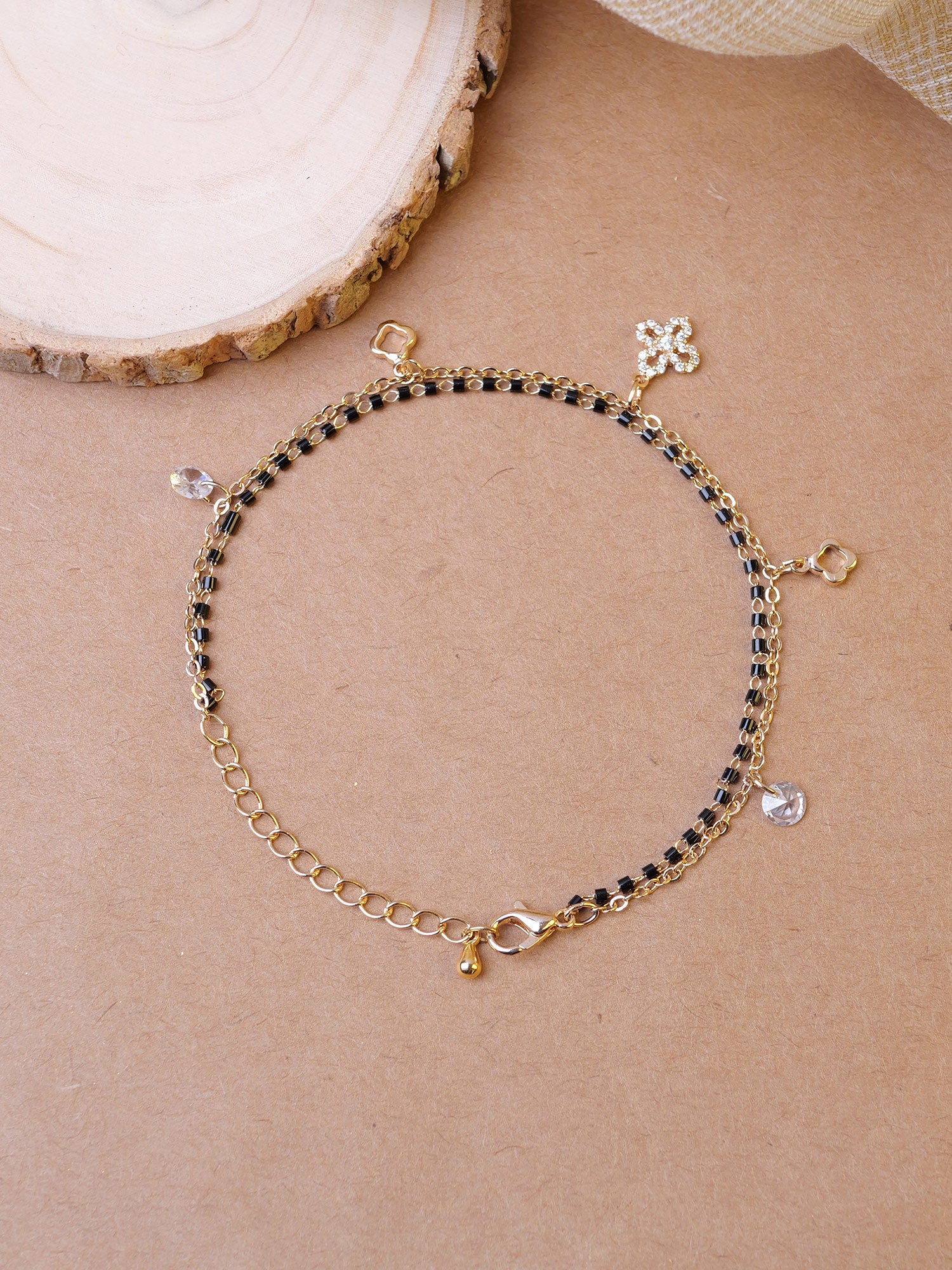 Amelia Charm Bracelet in White and Gold