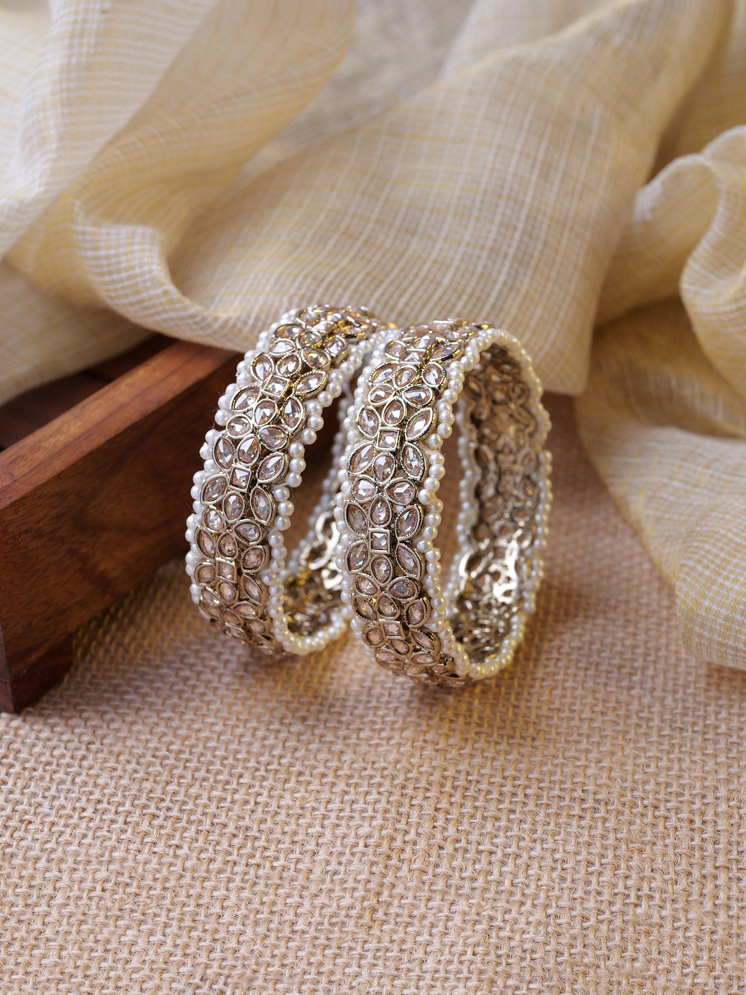 Chandni Pearl Kadas in Champagne