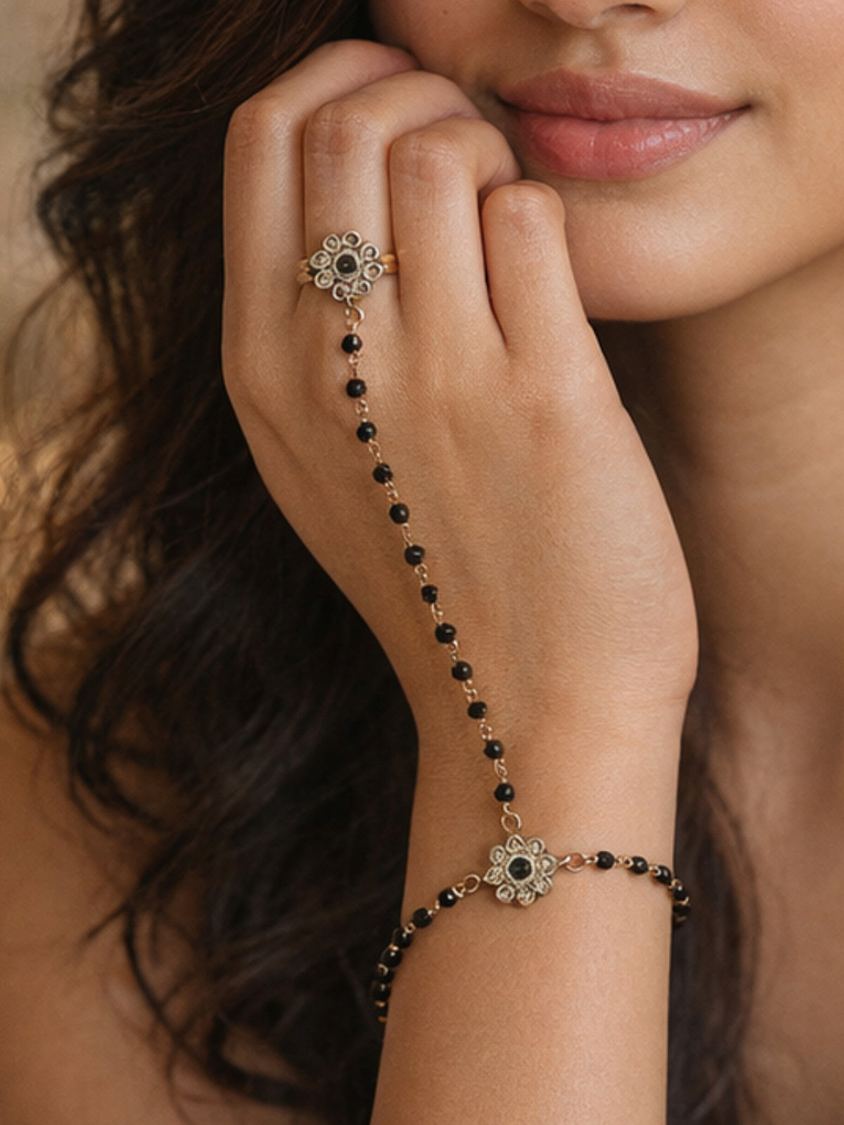 Forever Floral Hand Chain in Black and Antique Gold