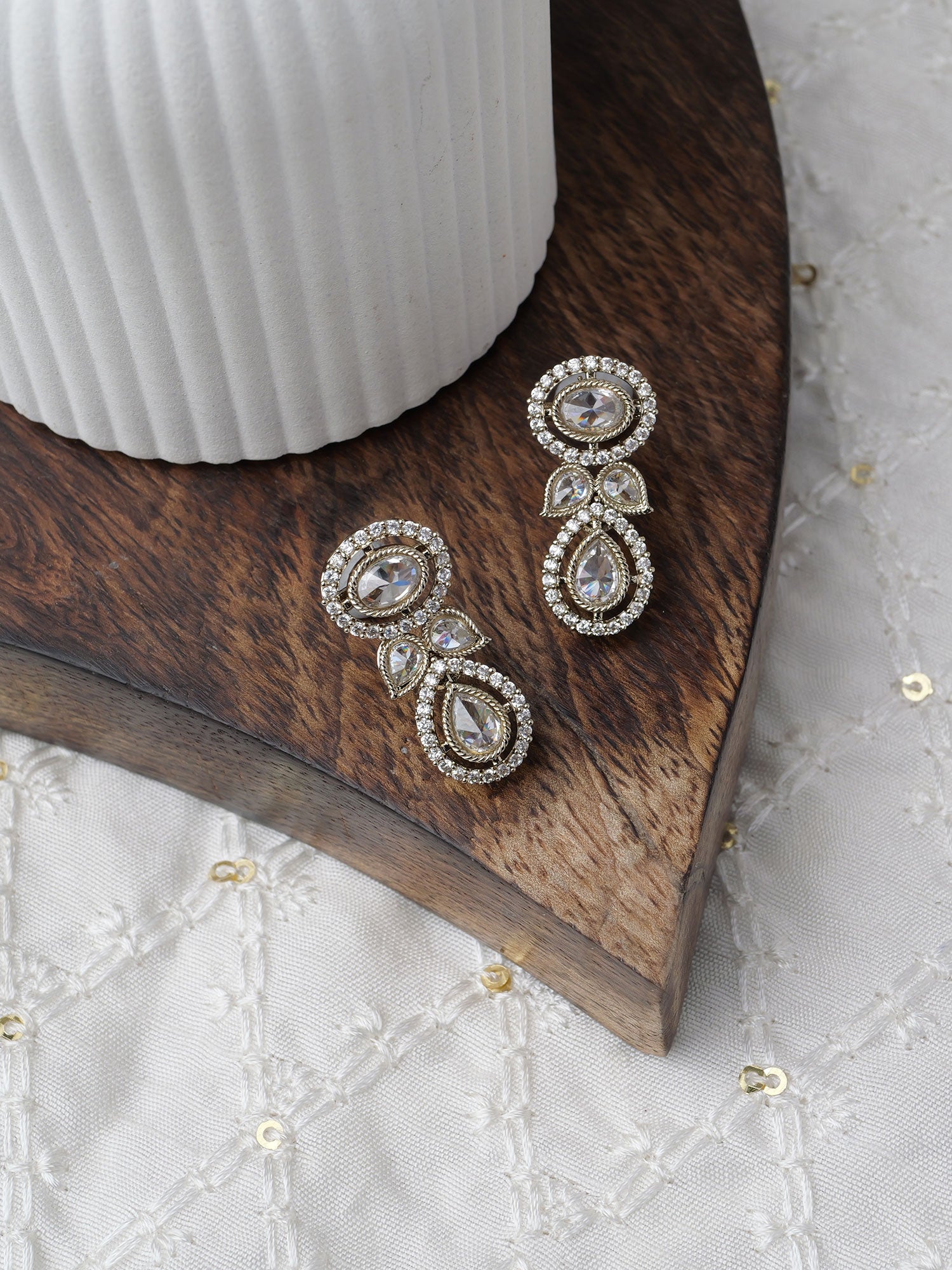 Heeral Crystals Earrings in White