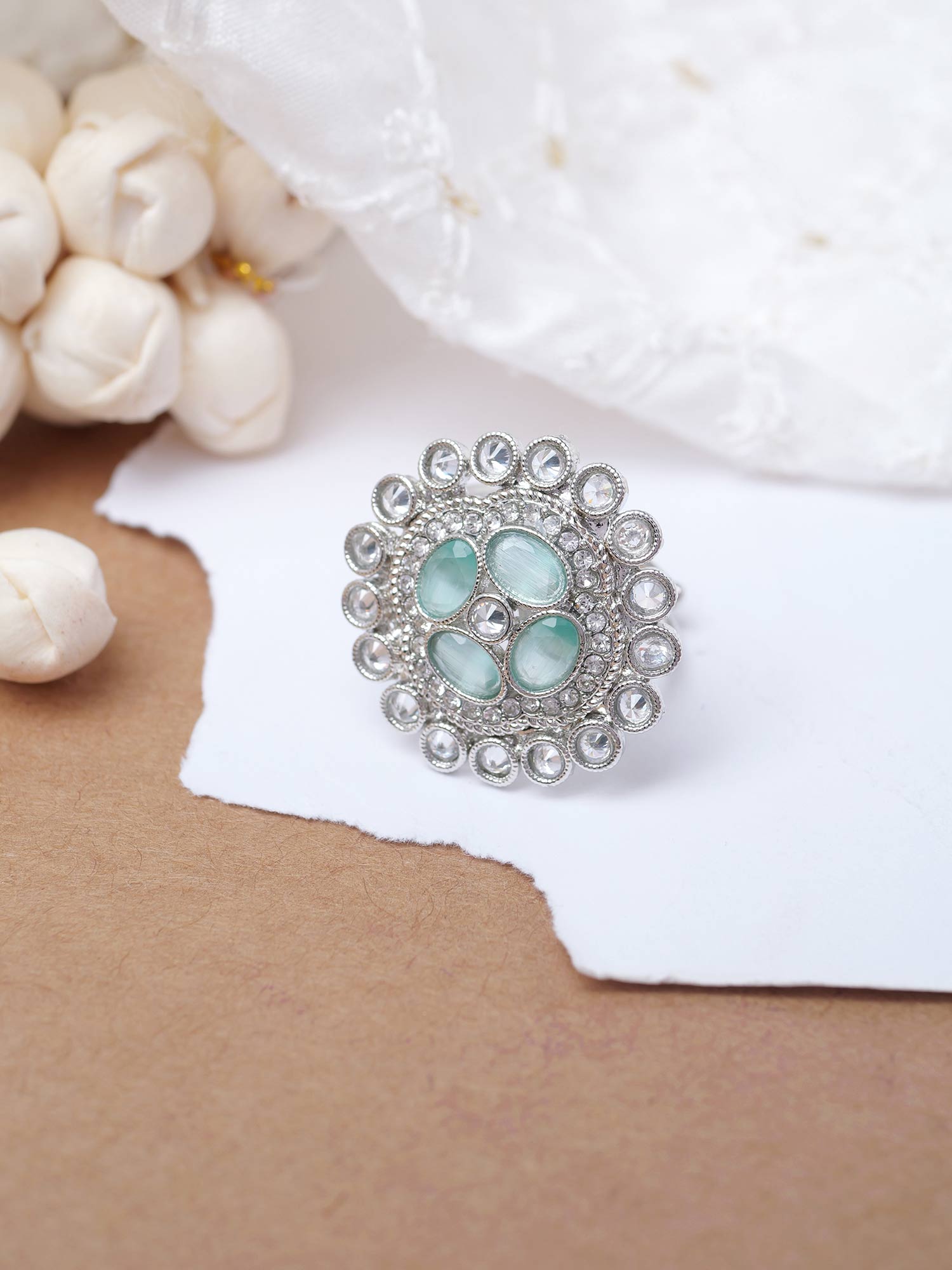 Jahnavi Ring in Mint and Rhodium