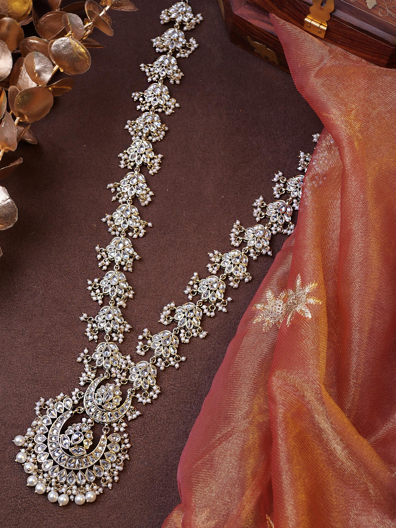 Mehreen Rani Haar in Pearl and White