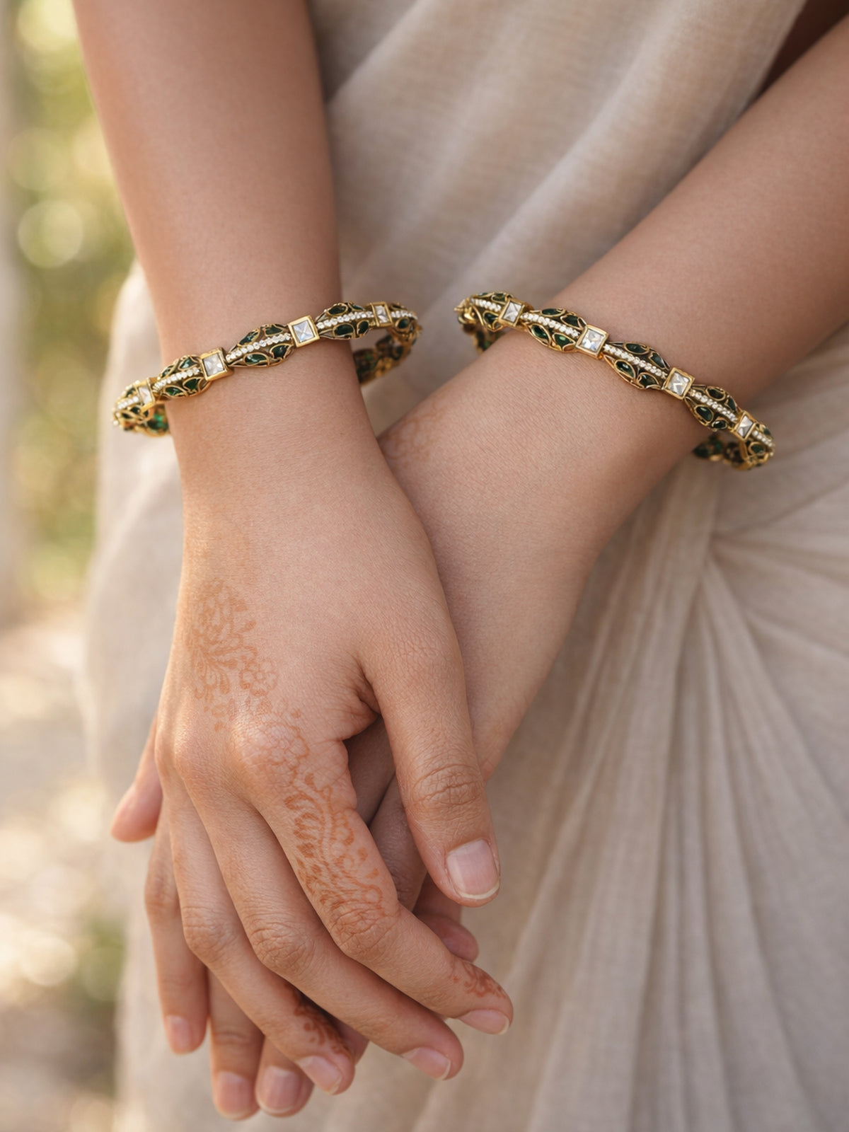 Nivya Kundan Bangles in Green 