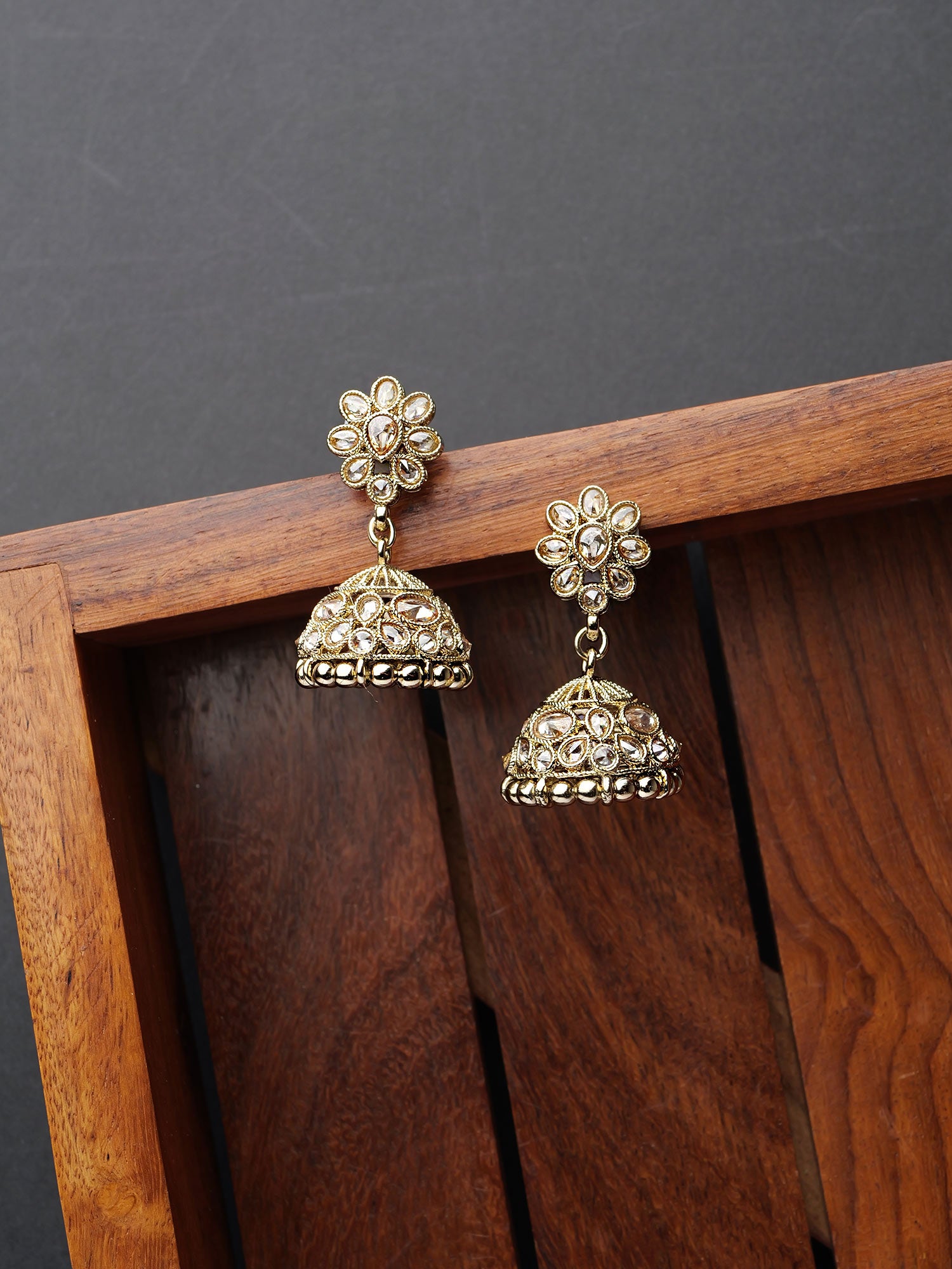 Nyra Jhumka Earrings in Antique Gold