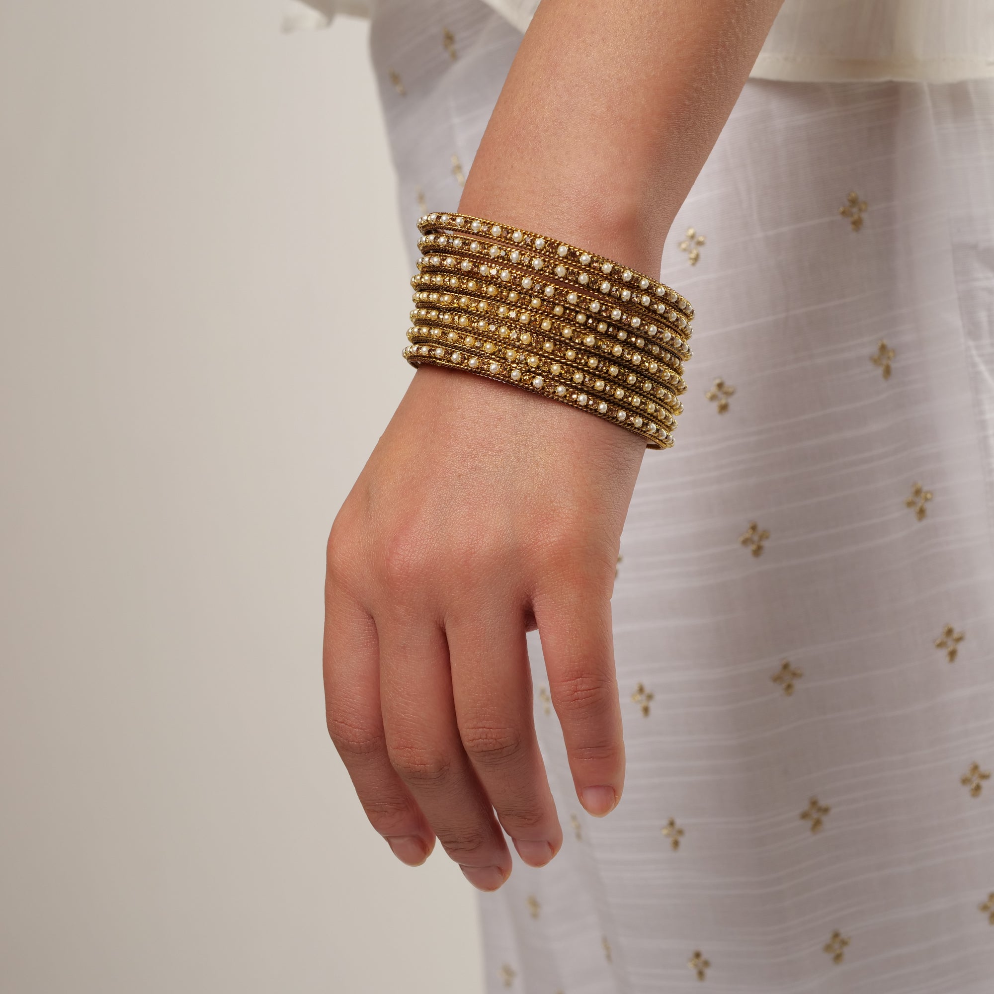 Set of 8 Pearl Bangles in Antique Gold