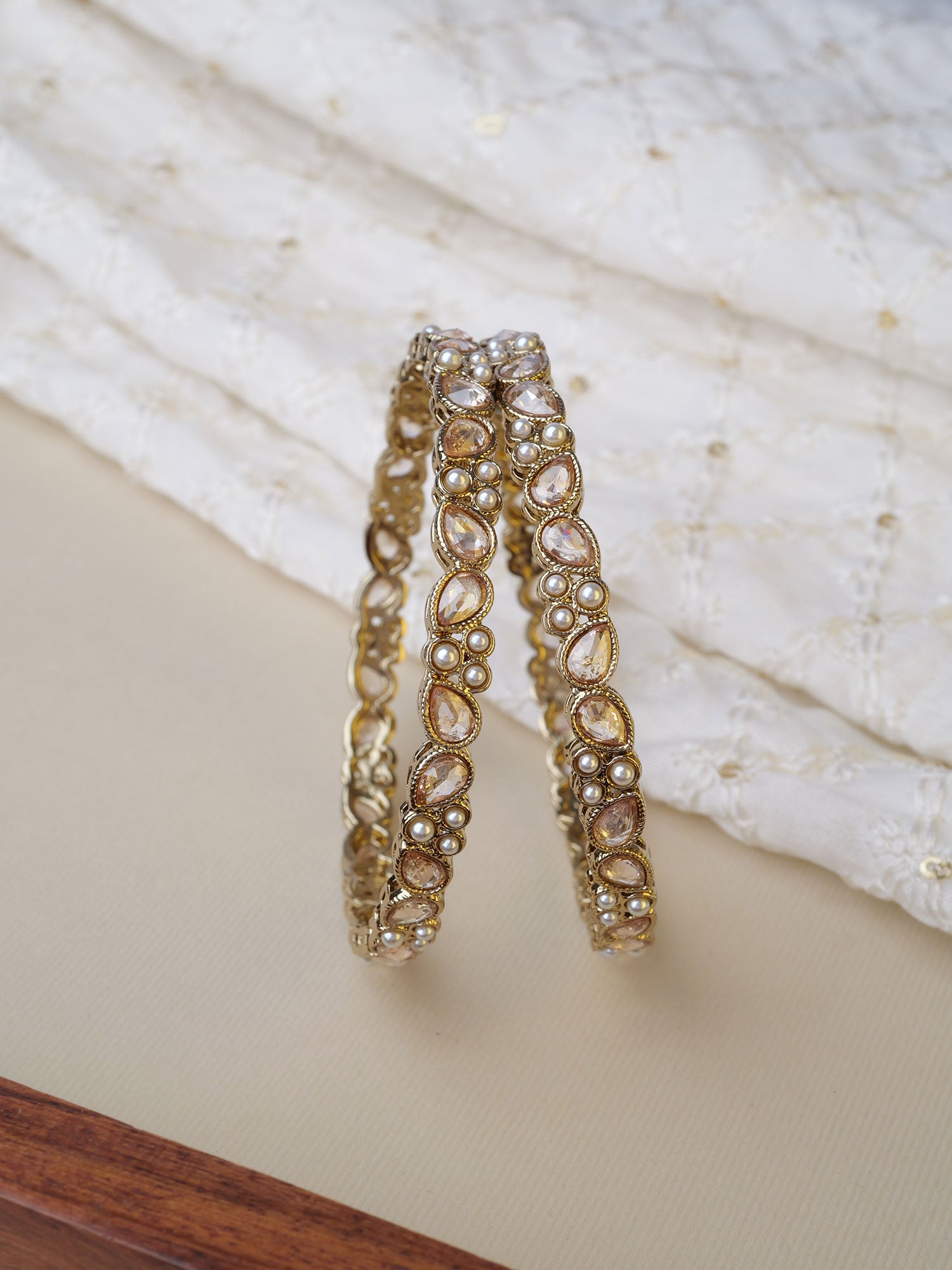 Tarangi Kada Pearl Bangles in Champagne
