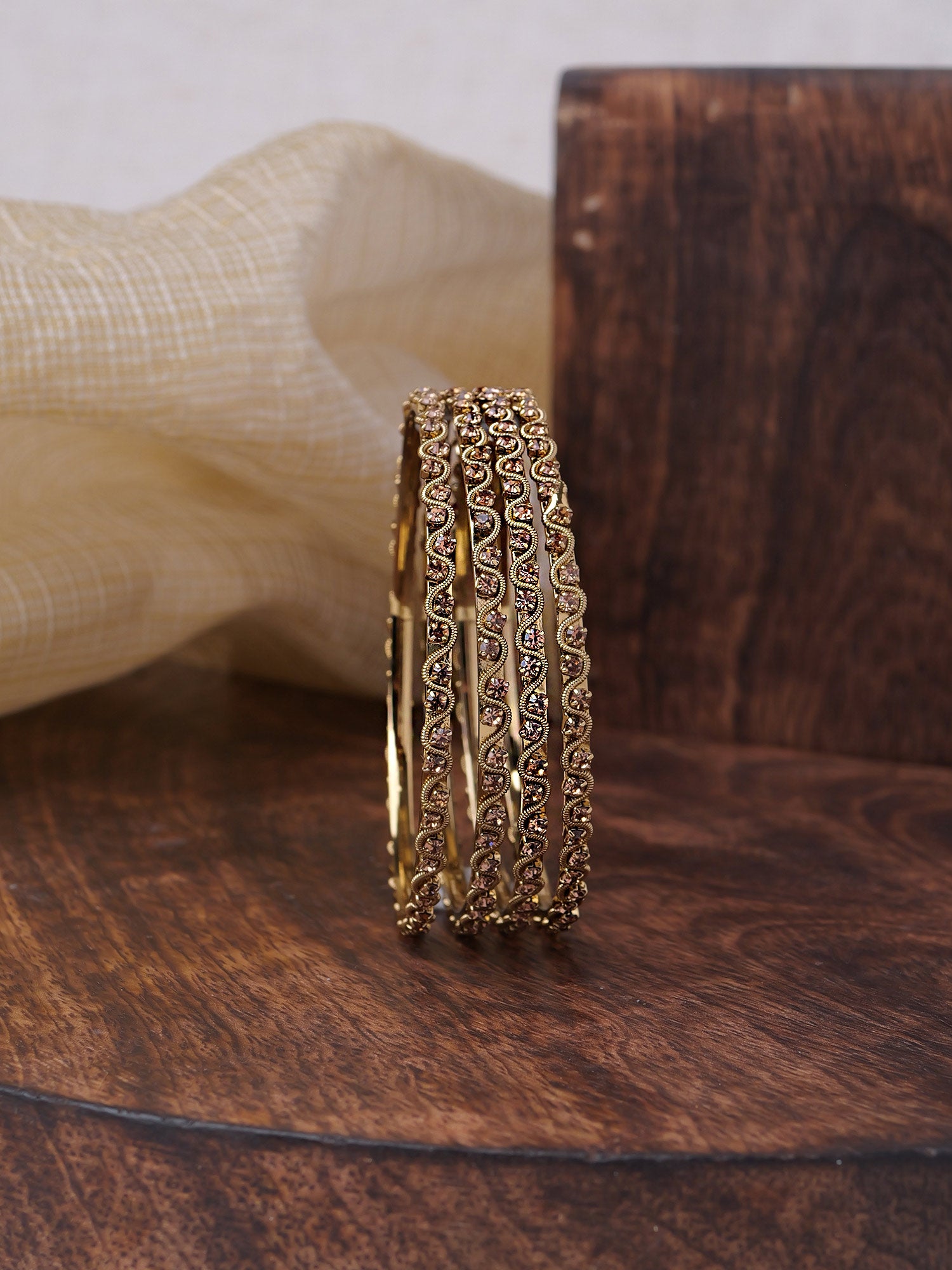 Veya Set of 4 Diamante Bangles in Champagne